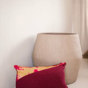 cushion cover in batik and pink boucle velvet