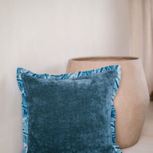 cushion cover in velvet with a batik trim