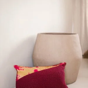 cushion cover in batik and pink boucle velvet
