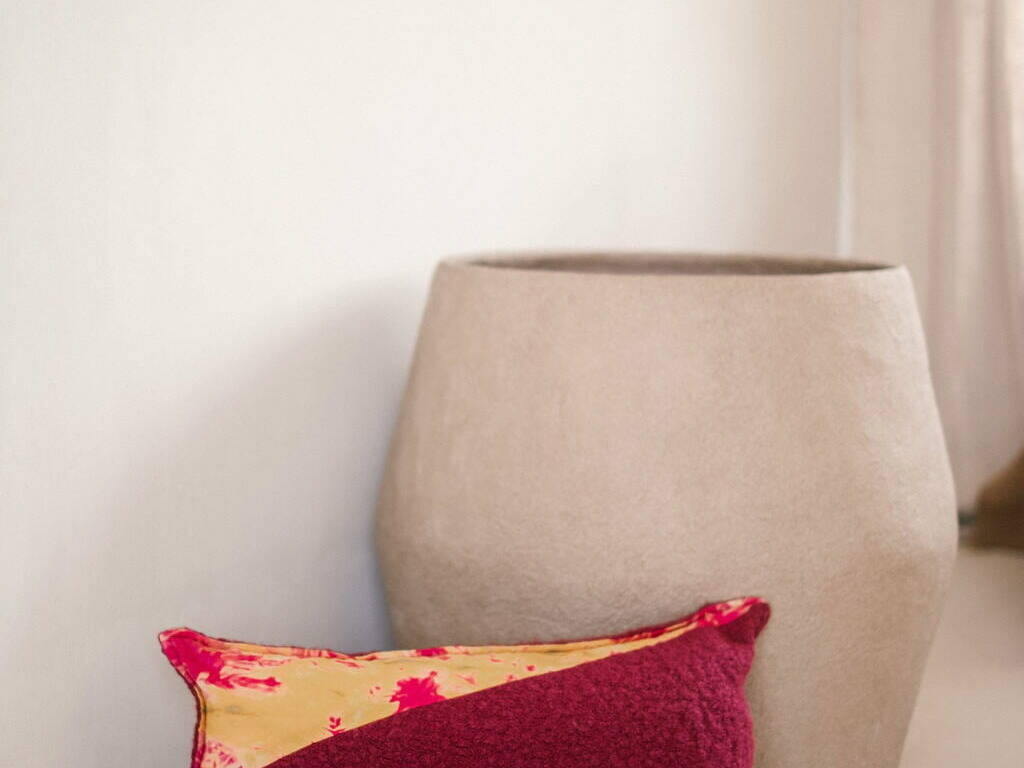 cushion cover in batik and pink boucle velvet