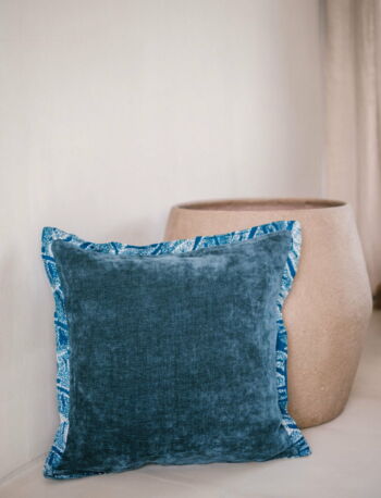 cushion cover in velvet with a batik trim